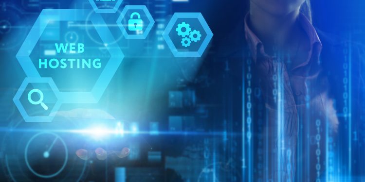 Business, Technology, Internet and network concept. Young businessman working on a virtual screen of the future and sees the inscription: Web hosting